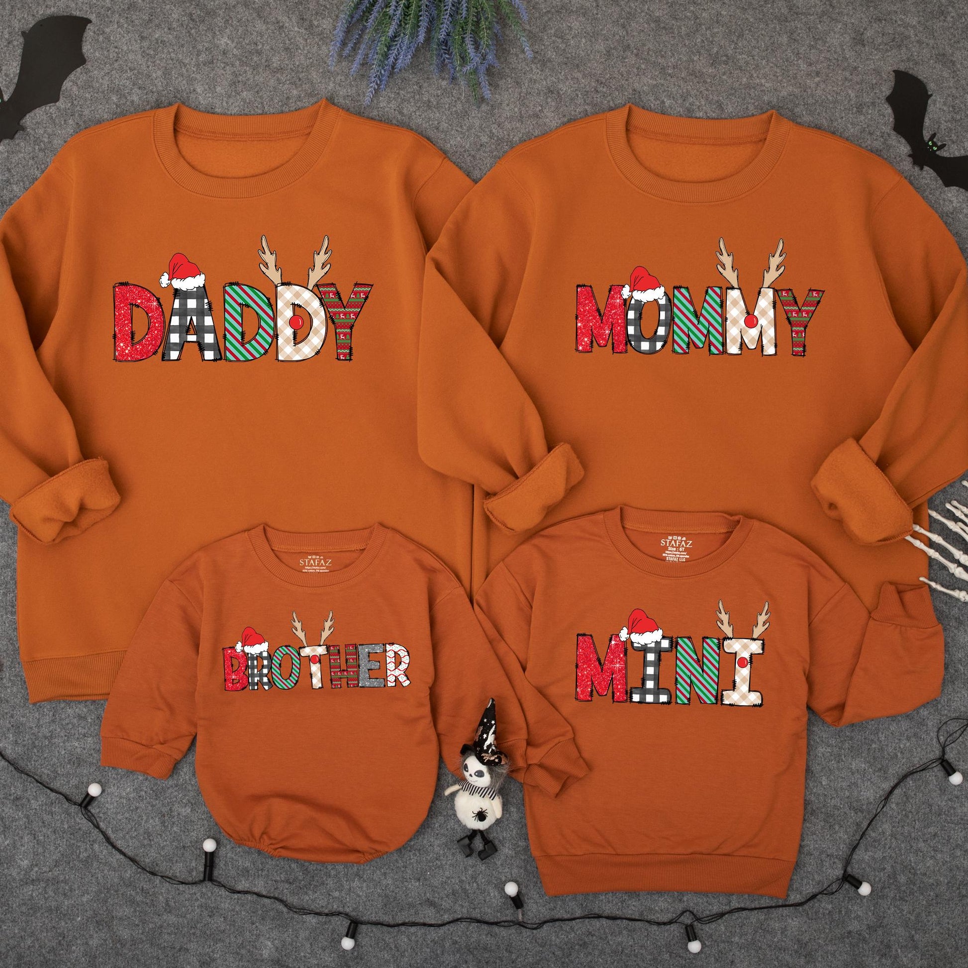 Personalized Matching Family Christmas Sweatshirt with Festive Reindeer Lettering featuring Santa Hats and Cozy Holiday Patterns for Xmas PJs