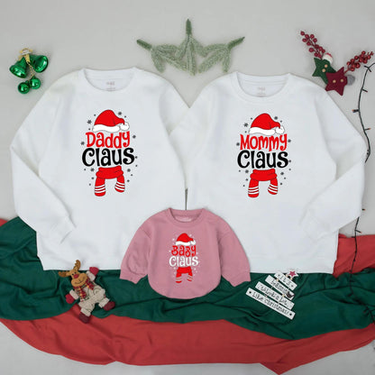 Custom Claus Family Sweatshirts Matching Christmas Holiday Outfits with Red Santa Hats and Snowflakes Perfect for Xmas Parties and Family Reunions