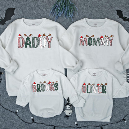 Personalized Christmas Family Sweatshirts Daddy Mommy Custom Names with Reindeer Antlers and Santa Hats Festive Holiday Outfits for Mom Dad and Kids