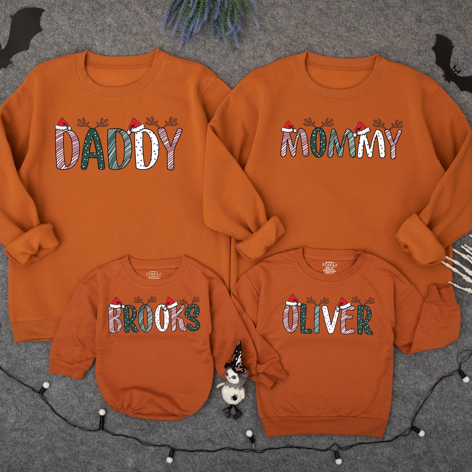 Personalized Christmas Family Sweatshirts Daddy Mommy Custom Names with Reindeer Antlers and Santa Hats Festive Holiday Outfits for Mom Dad and Kids