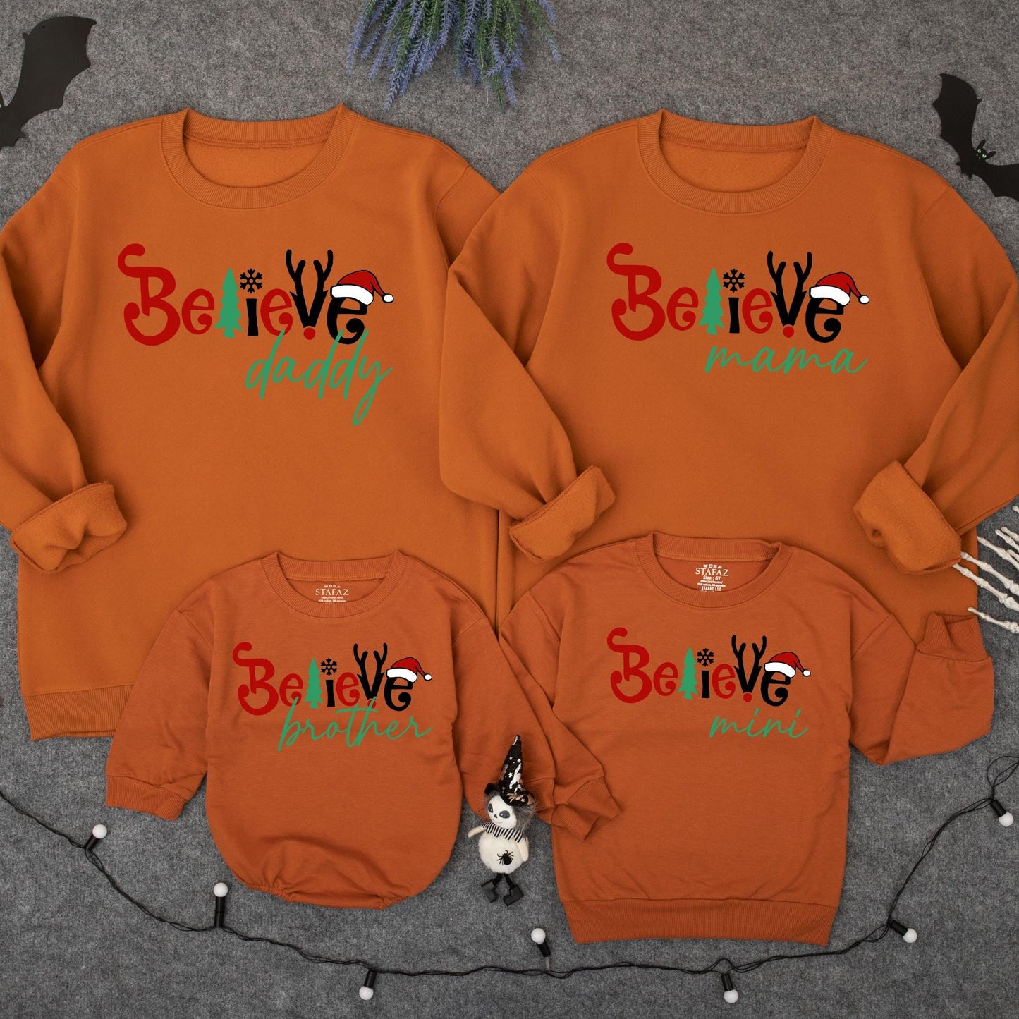 Matching Family Christmas Sweatshirts with 'Believe' for Mama Daddy Brother Mini, a festive retro holiday outfit set for family celebration